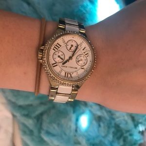 Gold and white Michael Kors watch